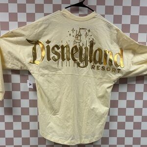 Disney Cream Long Sleeve Spirit Jersey shirt with Gold Emblem